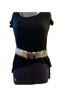 Stretchy sequin belt with large silver heart buckle